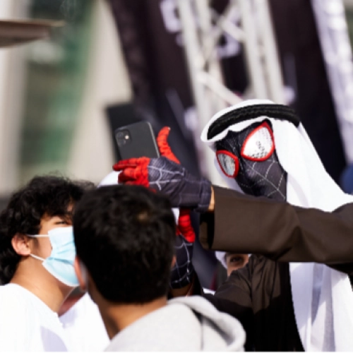 Black Spiderman taking selfie at the Middle East Comic Con 2022